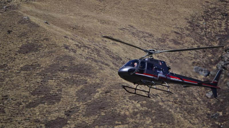 Helicopter landing near Muktinath Temple in Mustang, Nepal